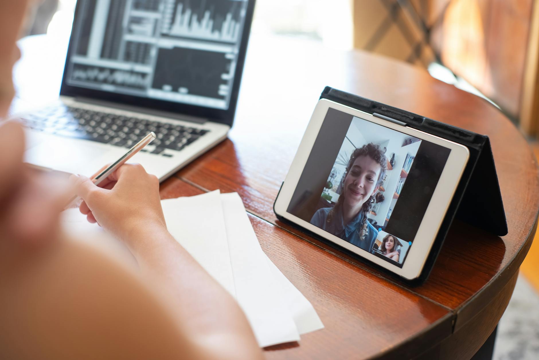 10 Best AI CRM For Small Businesses in 2026 2 sales representative on a video call with a client, with a split-screen view showing CRM notes and an AI-generated follow-up email draft